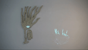 sea tangle, plywood, paper pulp, natural dye, projection, 2023